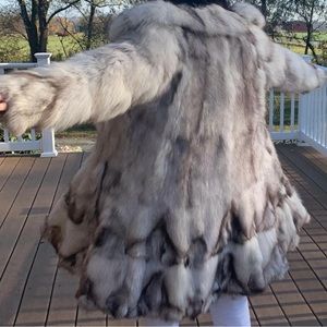 Blue and silver fox Mid length trapeze shape.Very warm,figure flattering